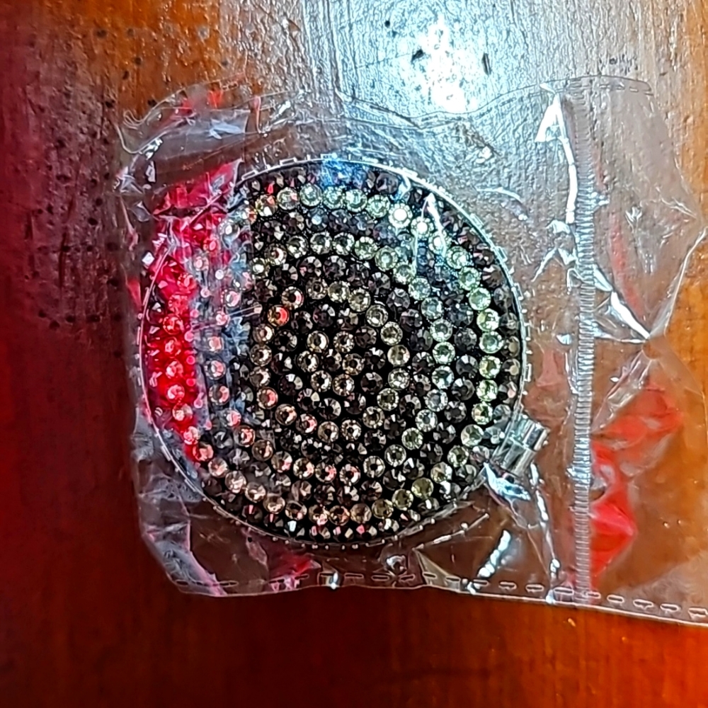 Crystal encrusted compact mirror